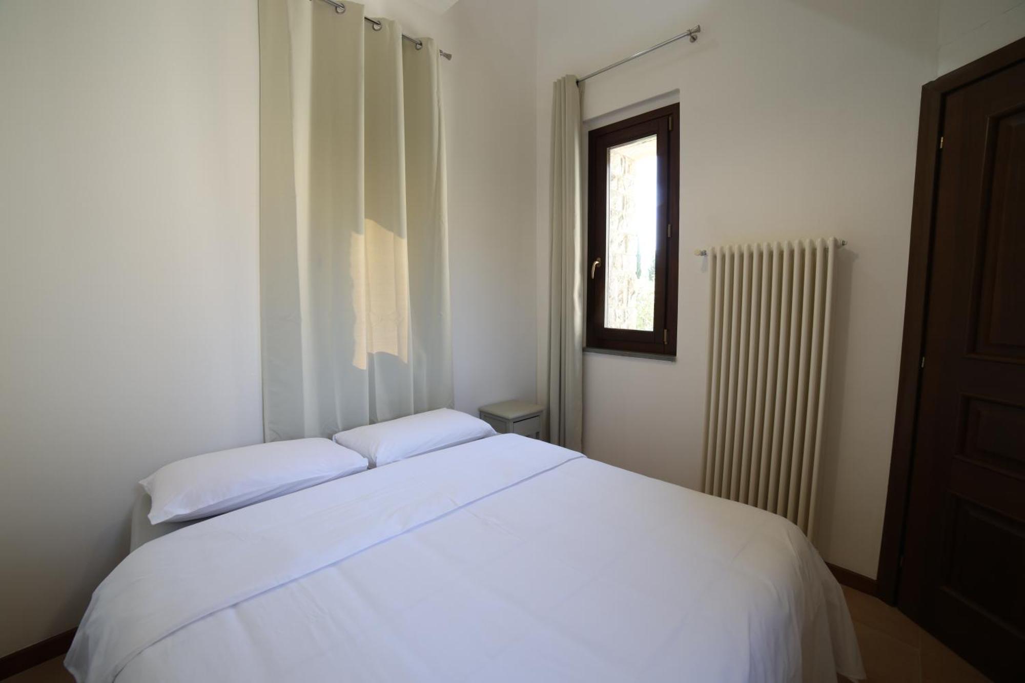 Ht Castello Di Campolongo Aparthotel Valfabbrica ภายนอก รูปภาพ